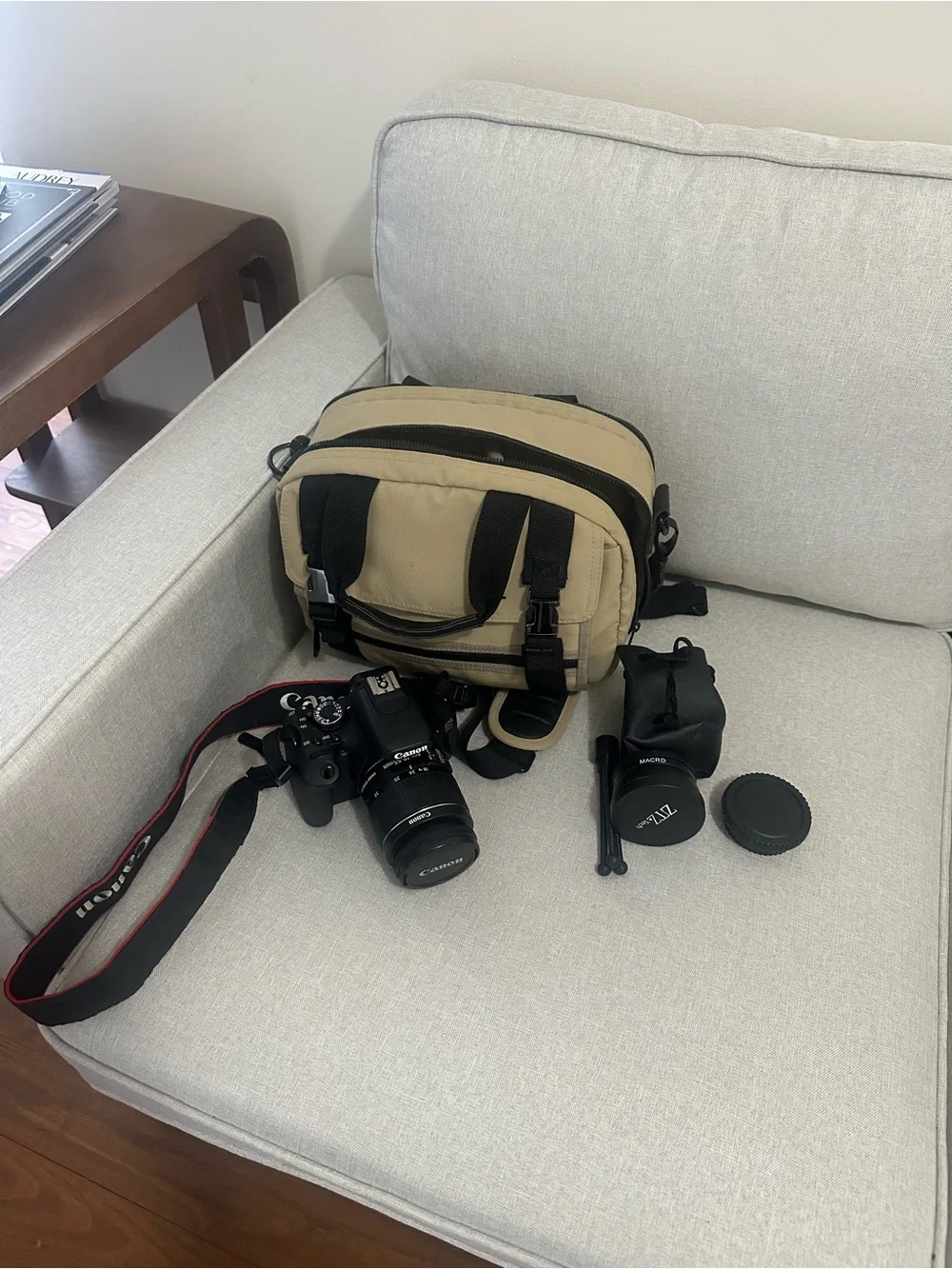 Canon DSLR Camera in Black with Red-Trim Strap